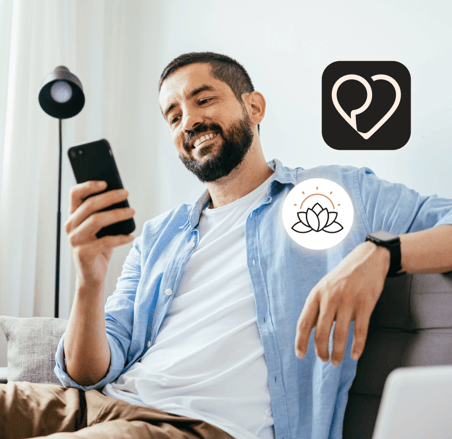 Dialogue - A man looking at his phone and two pictograms of Dialogue heart and a lotus flower
