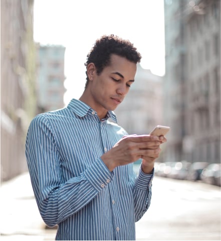 Man on his phone for medical information