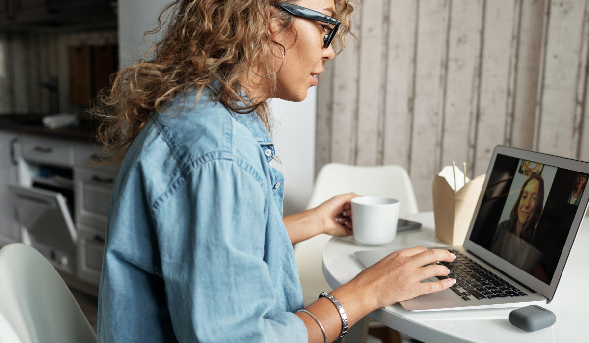 woman at laptop doing a EAP virtual consultation 