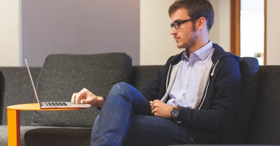 men on his computer